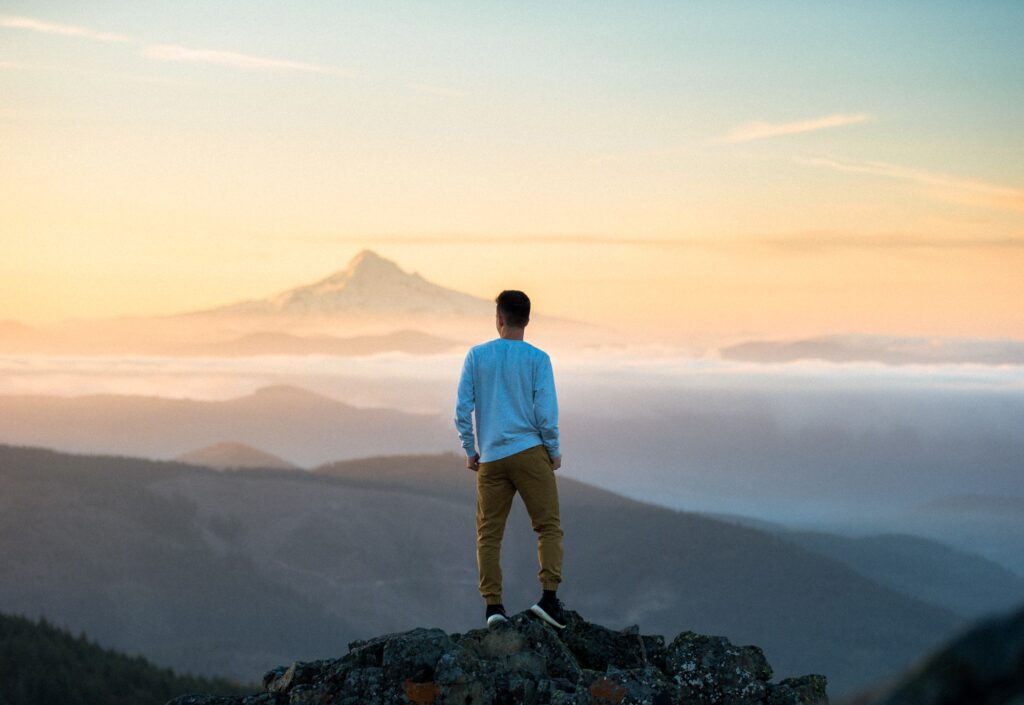 Man standing alone on mountain